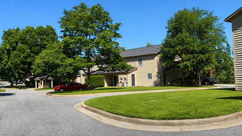 A residential area with houses and trees.