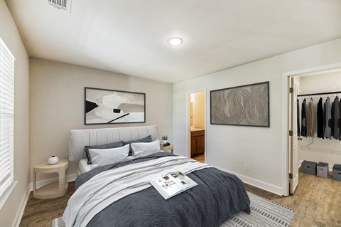 a bedroom with a bed and a closet