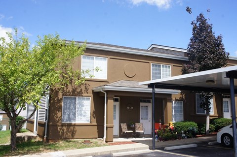 a brown building with a crescent moon painted on the side of it