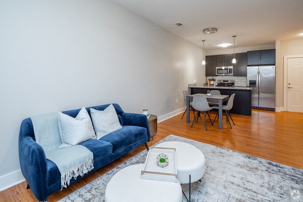 a living room with a couch and a table
