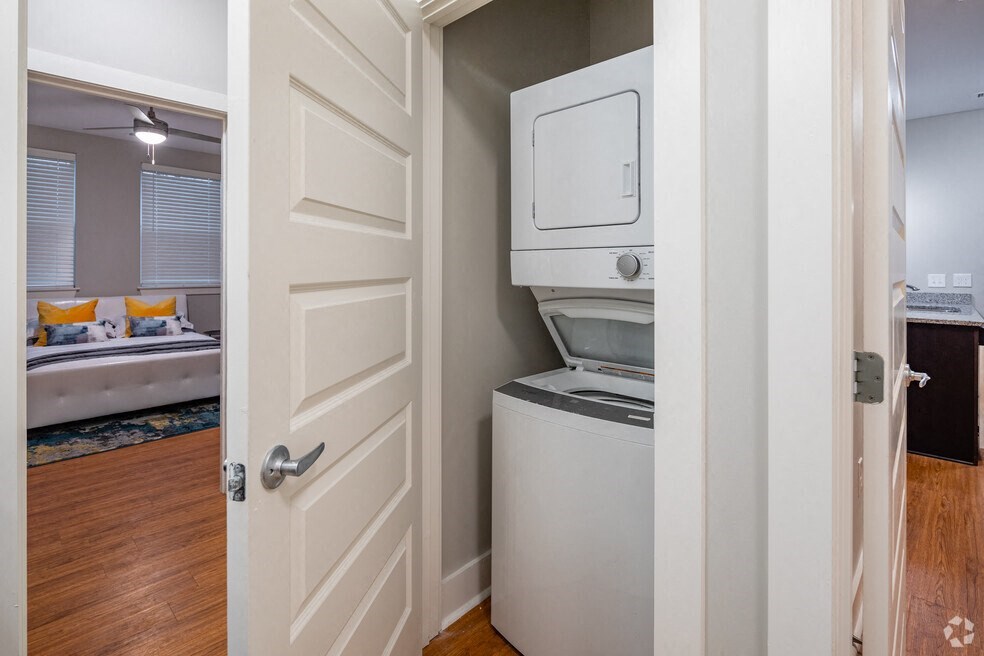 a laundry room with a washer and dryer in a closet