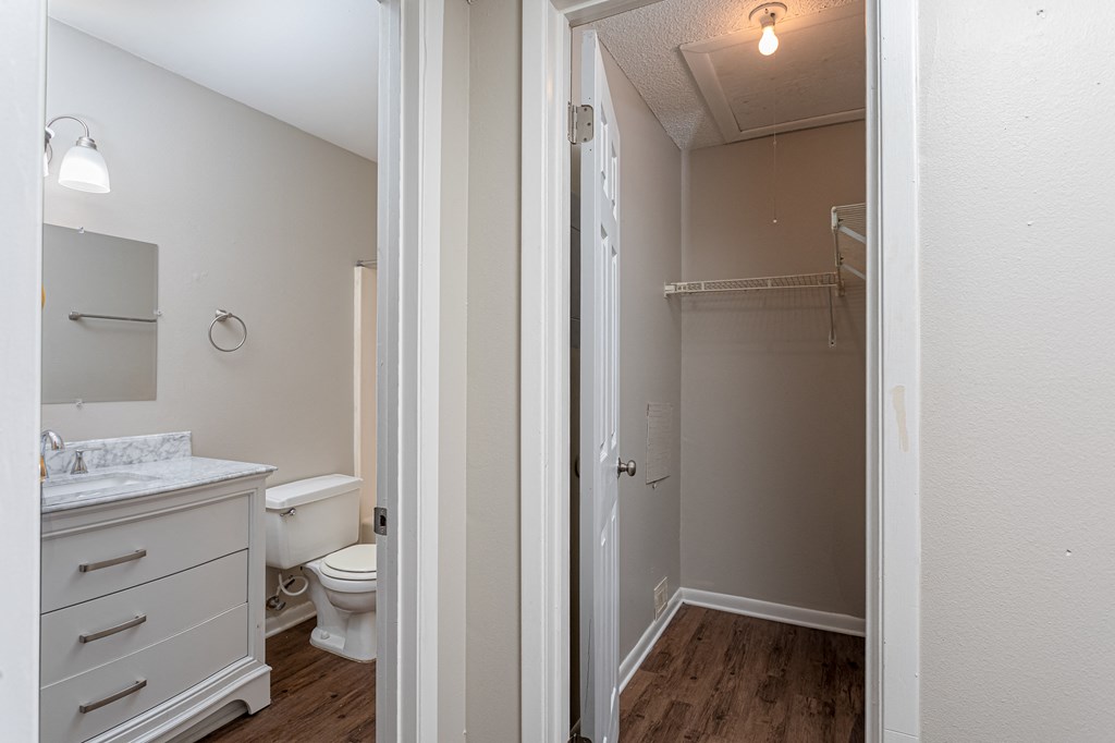 a bathroom with a toilet and a sink