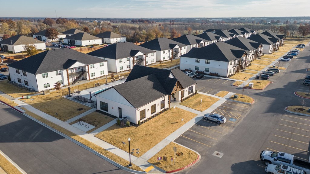 an aerial view of a group of houses in a neighborhood