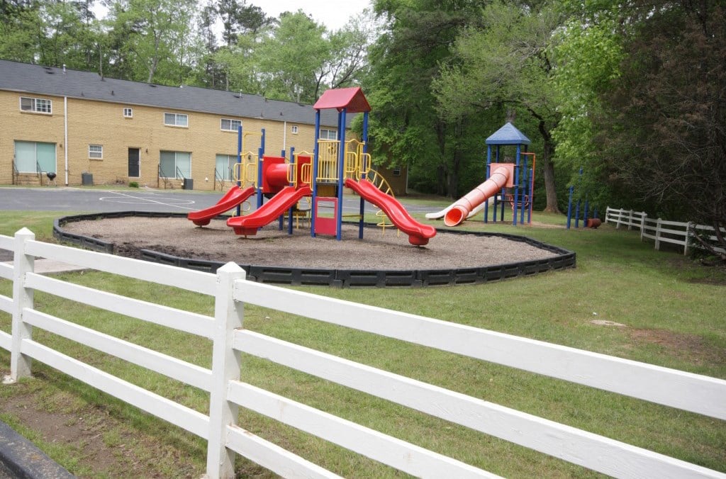 a playground with slides in a park