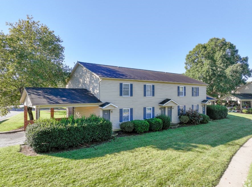 a house with solar panels on the roof