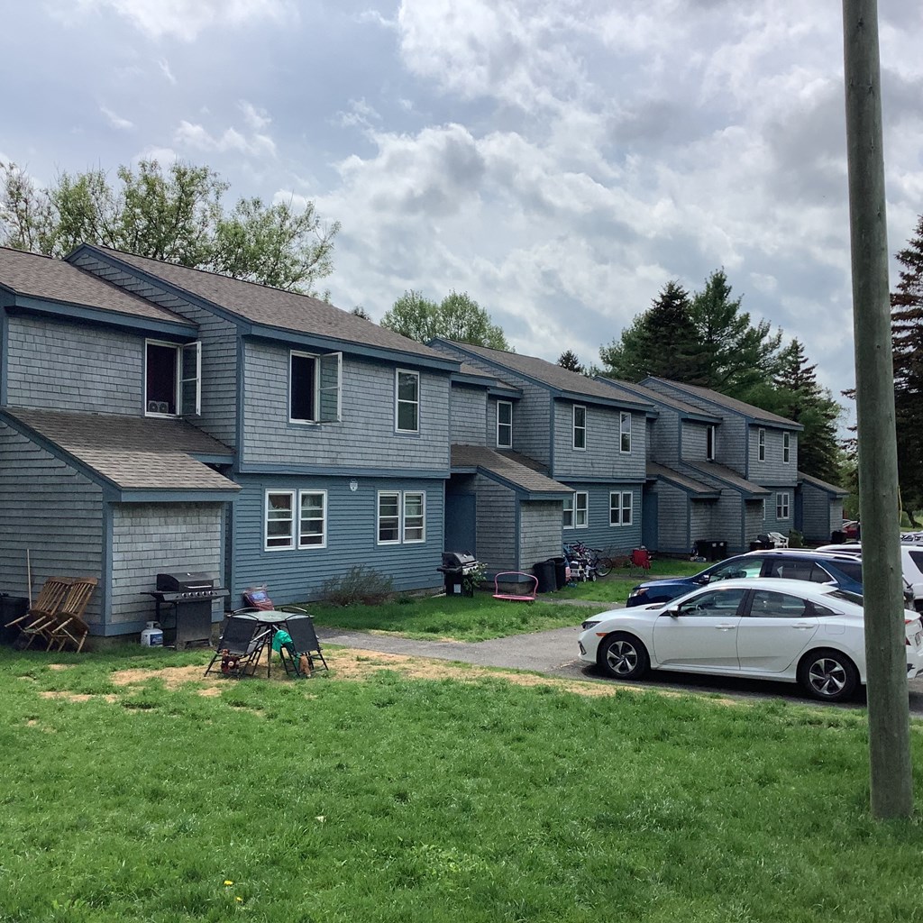 a house with a car parked in front of it
