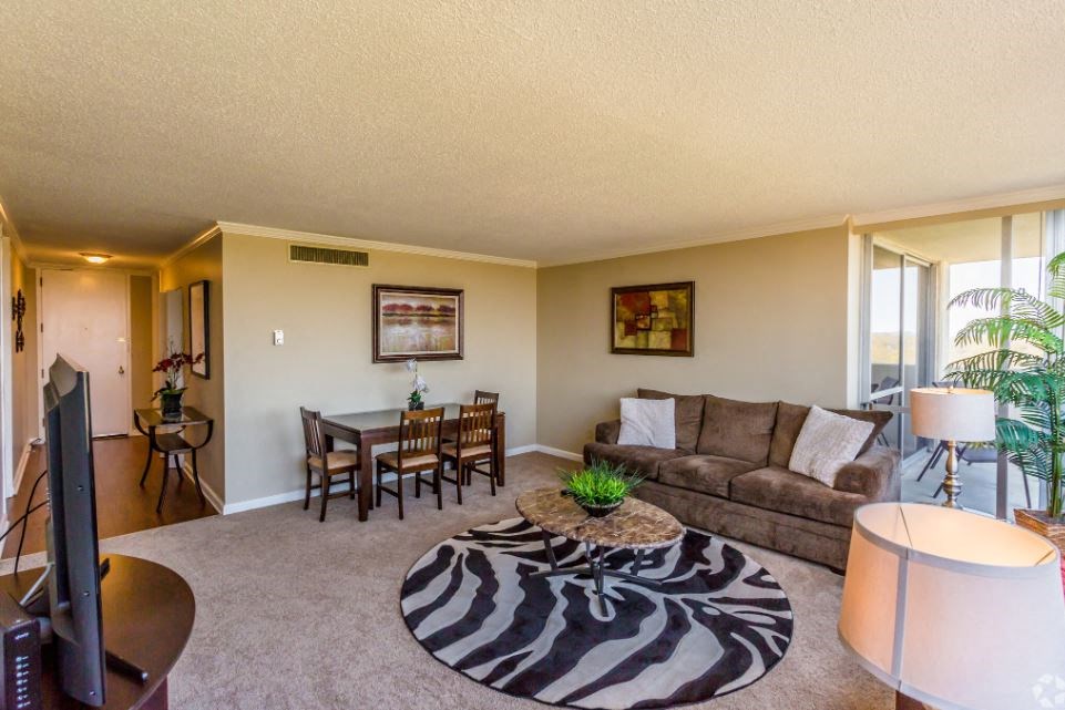 a living room with a couch and a table