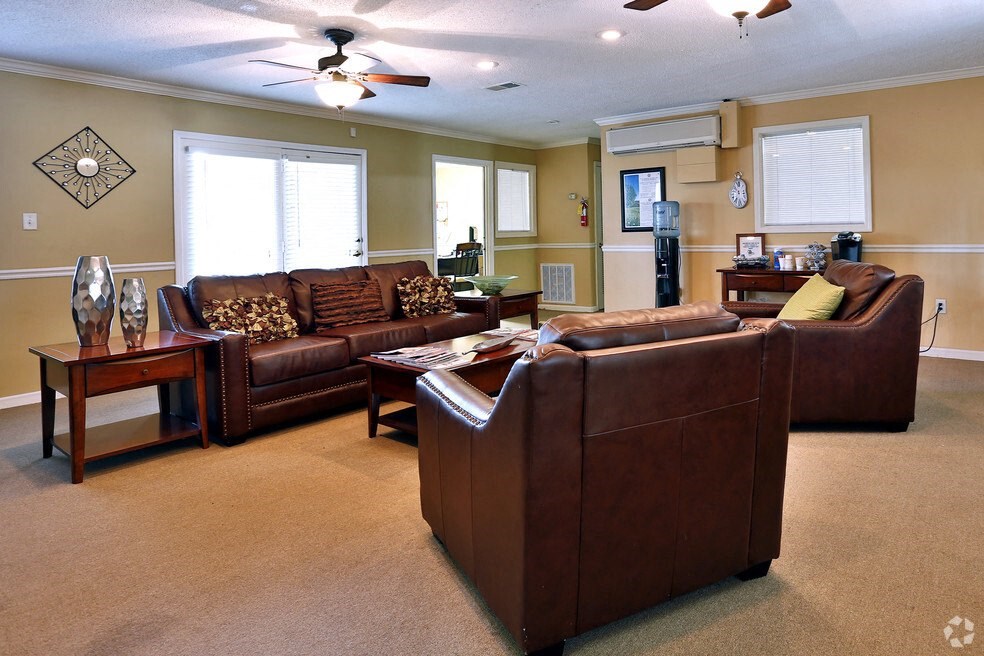 a living room with couches and a table