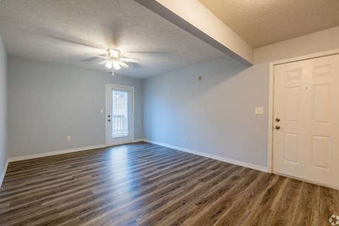 a bedroom with blue walls and a white door