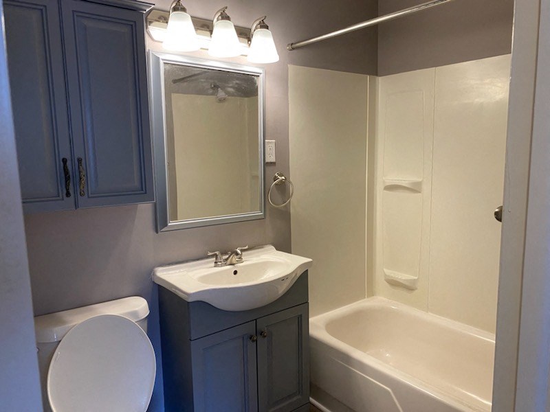 this is a photo of the bathroom in the 690 square foot 1 bedroom apartment at village