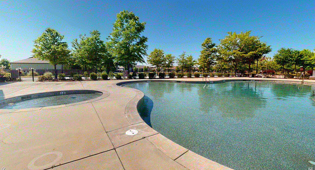 take a dip in the resort style pool at the enclave at woodbridge apartments in sugar land