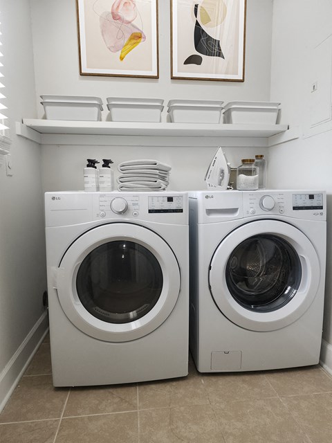 a washer and dryer in the laundry room of a home