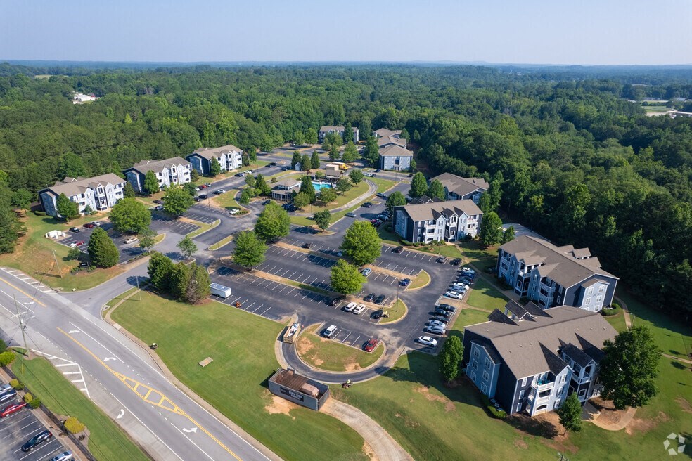 an aerial view of a neighborhood with houses and roads