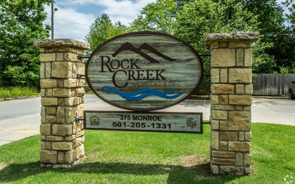 a sign that says rock creek