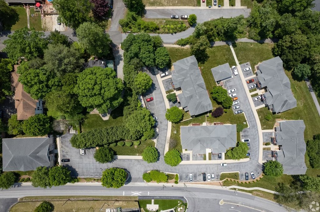 arial view of a neighborhood with houses and trees