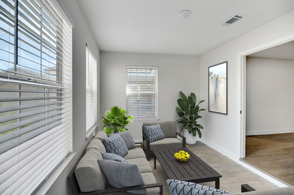 a living room with a couch and a coffee table