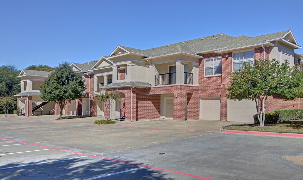 Exterior of building with garages  at Clearwater Creek, Texas