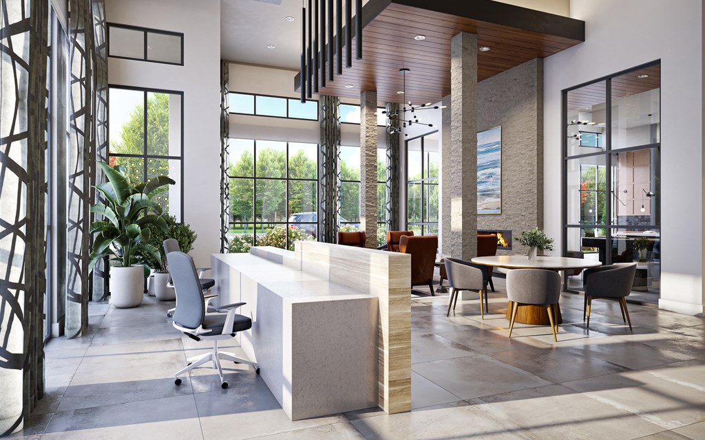 a lobby with a reception desk and a table with chairs