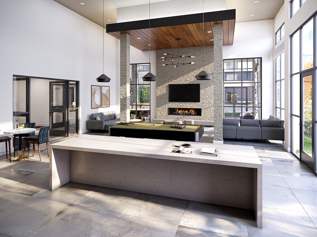 a kitchen and living room in a modern house