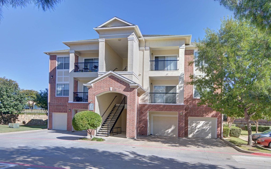 Exterior of building with garages  at Clearwater Creek, Richardson, Texas