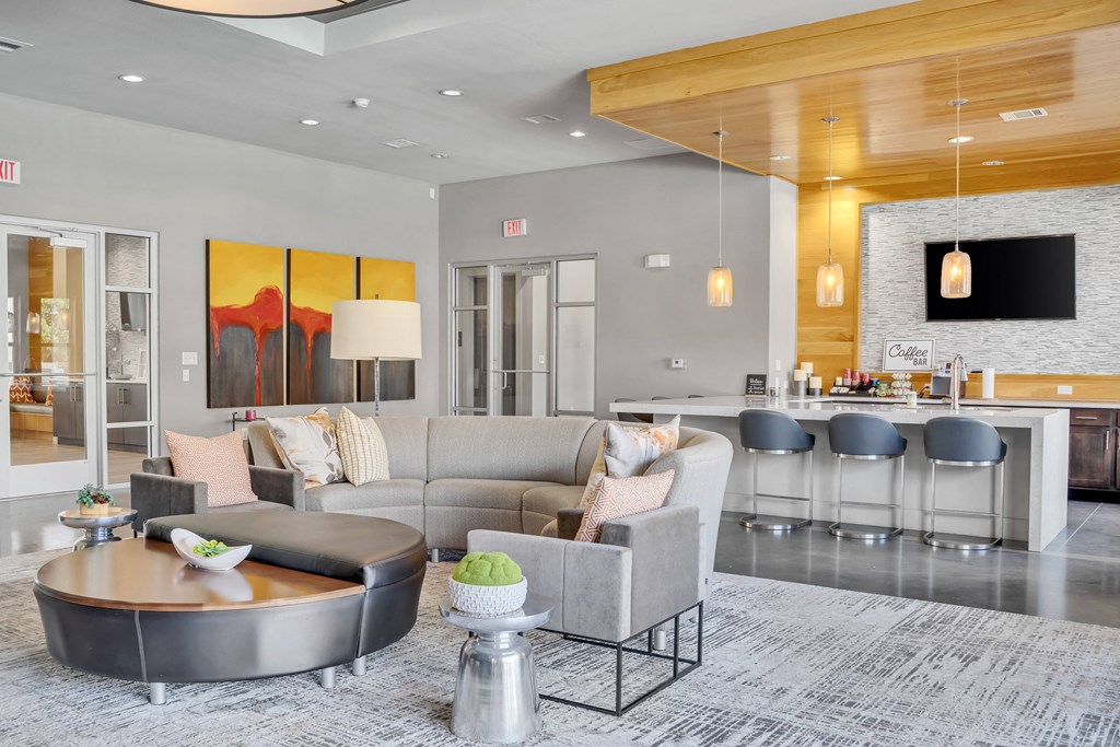 a living room with a couch and a table