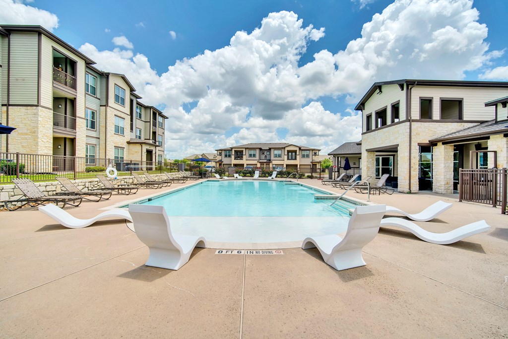 the preserve at ballantyne commons pool with apartment buildings