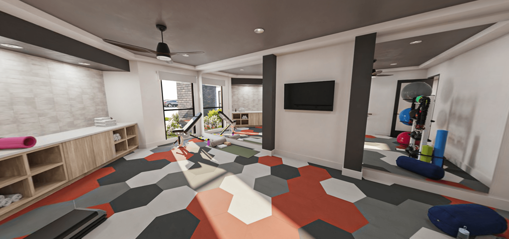 a kids play room with a geometric carpet and a television