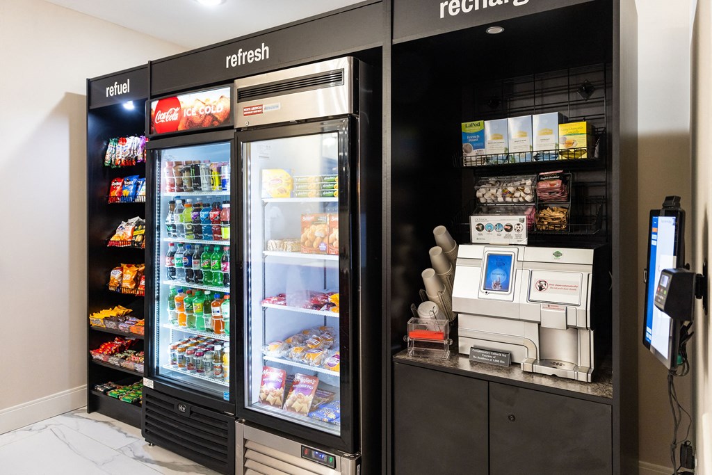 a refrigerator and a coffee machine in a store