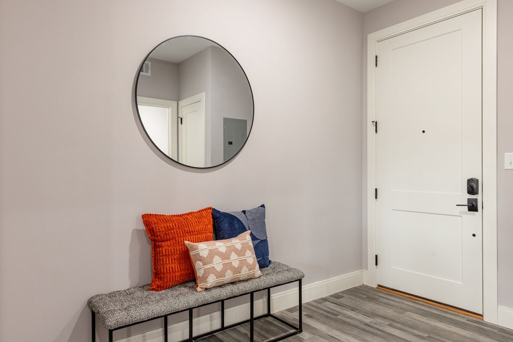 A white door is on the right side of the image.