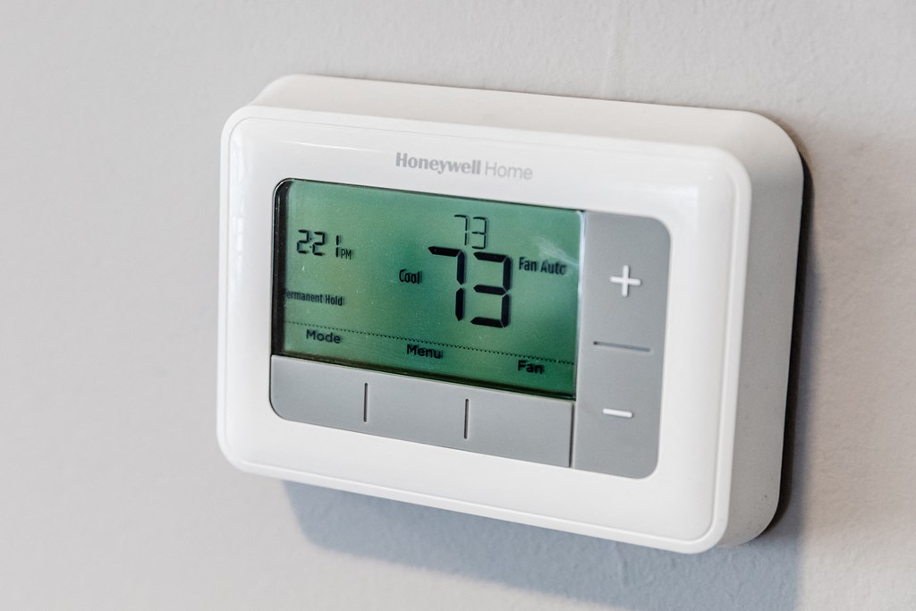 a thermostat on a wall