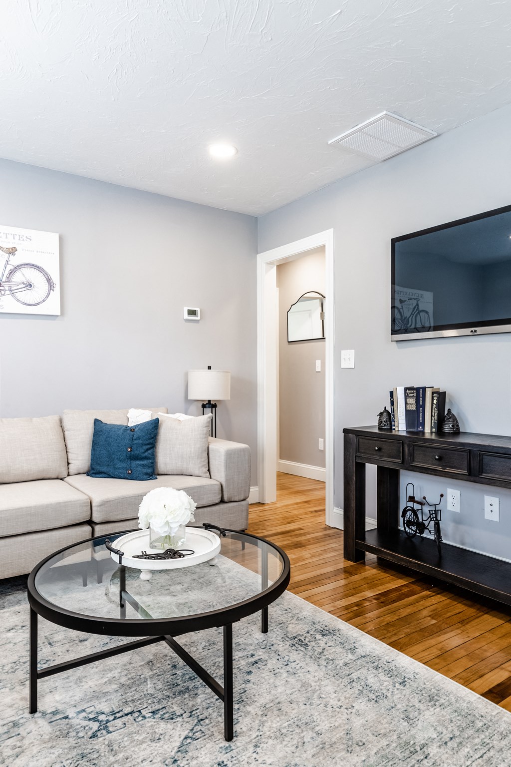 a living room with a couch and a coffee table