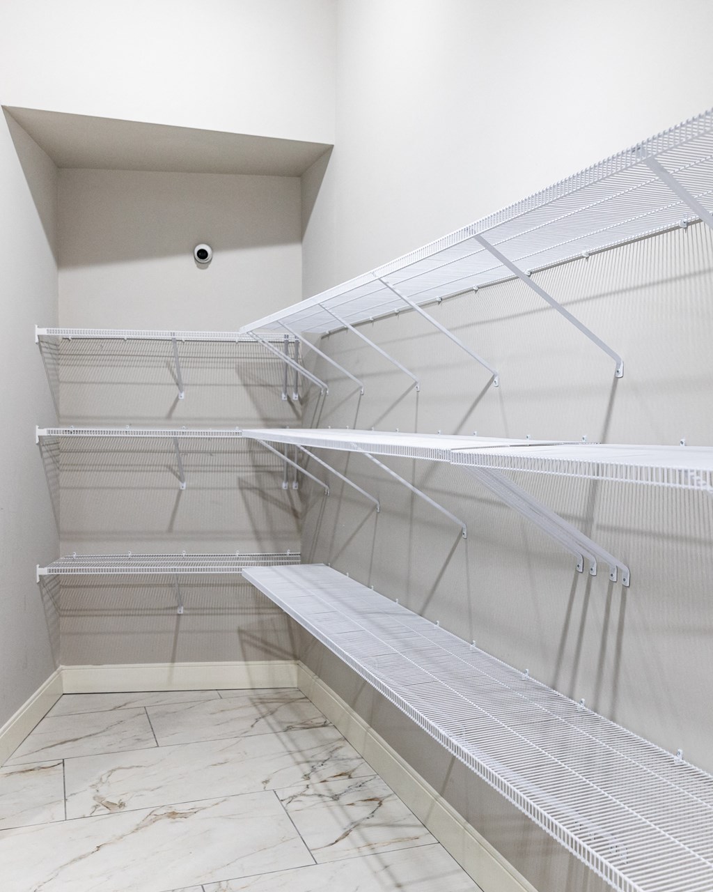 a spacious walk in closet in the second bedroom of the vue at creve coeur
