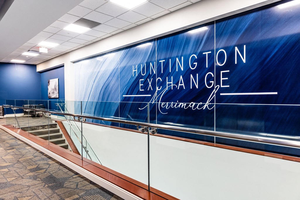 a large blue and white mural with the words huntington exchange menthol on it