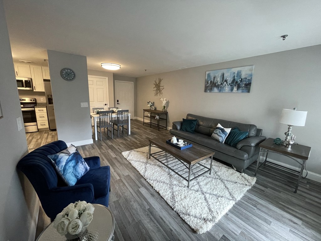 a living room with a couch and a table