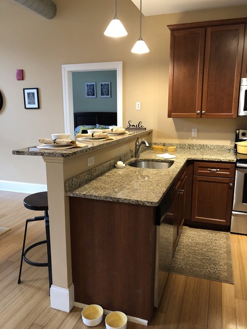 a kitchen with a counter top and a sink