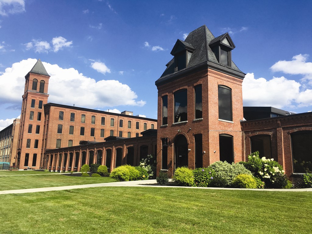 a large brick building with a clock tower on top of it