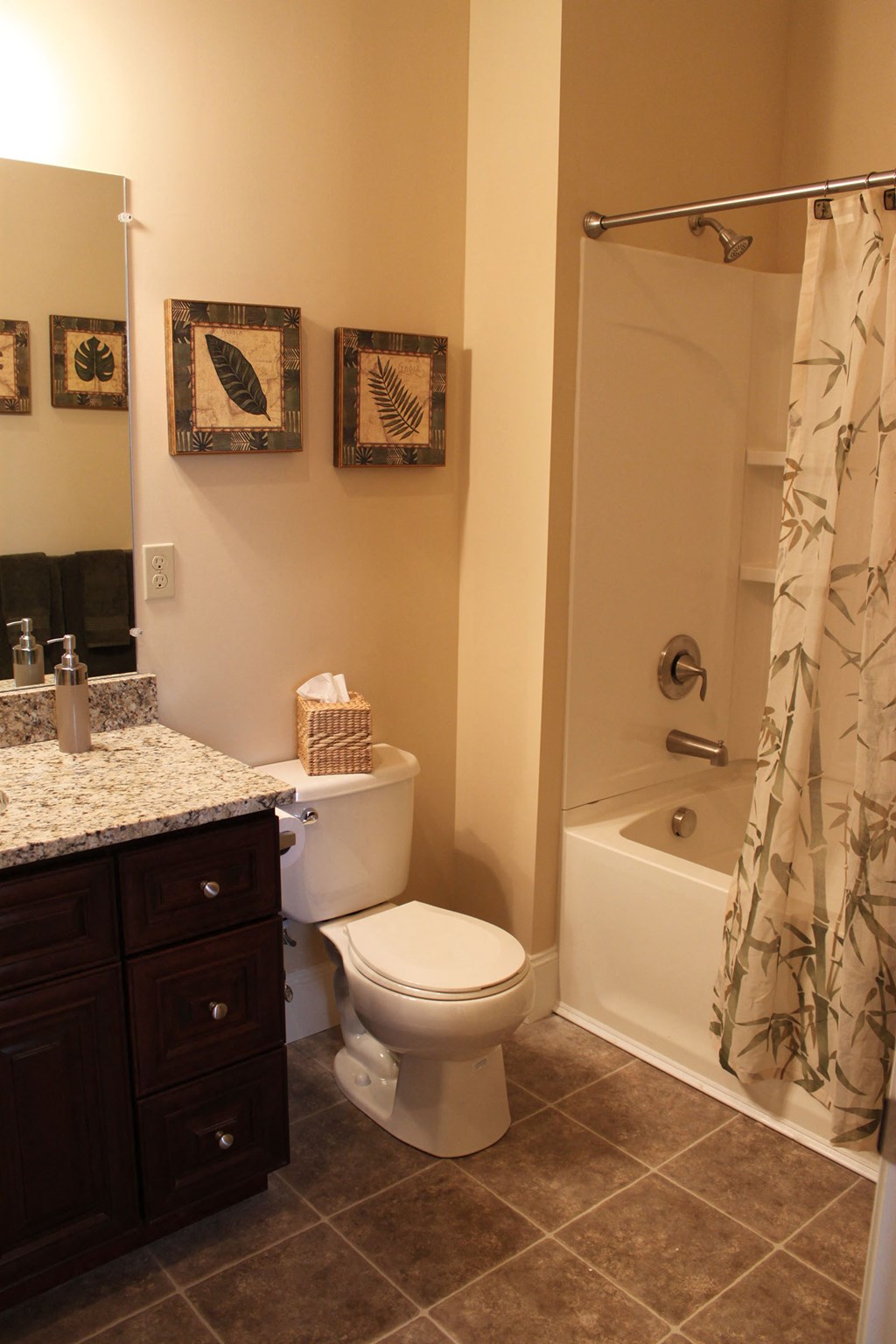 a bathroom with a toilet and a tub and a sink