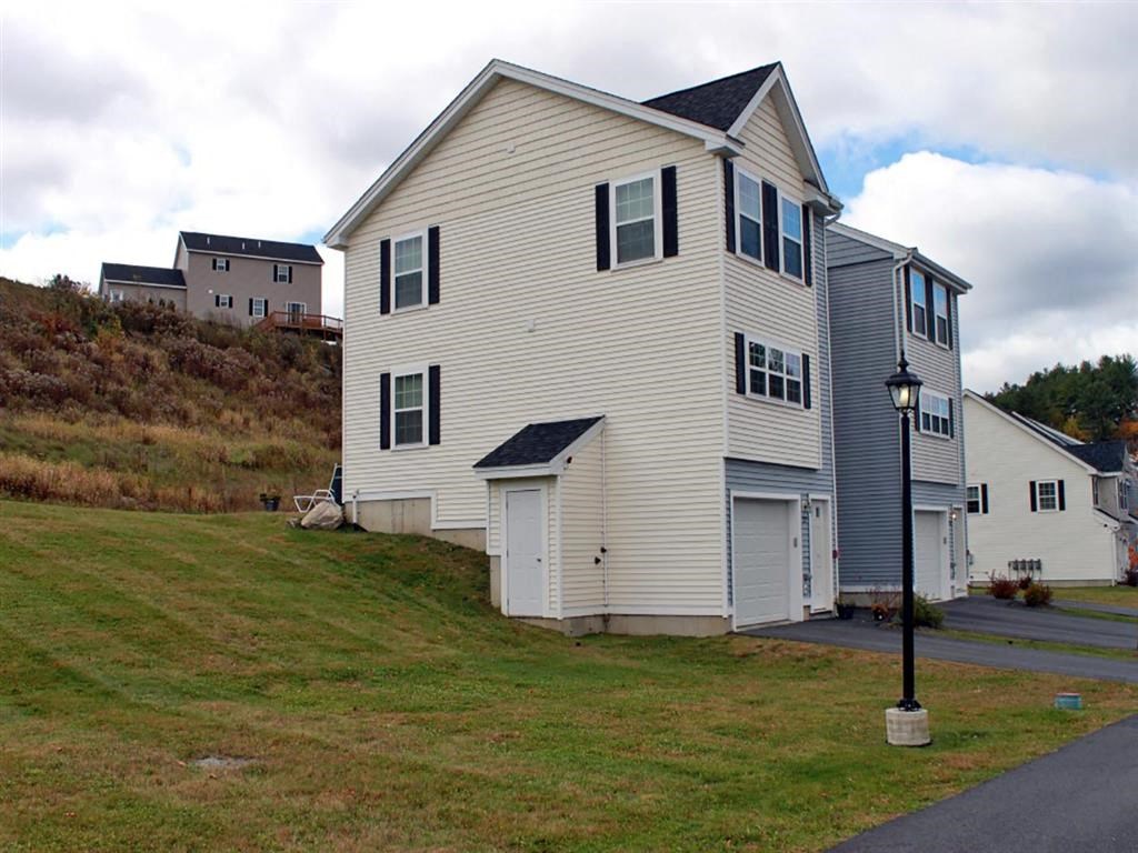 a house with a street light in front of it