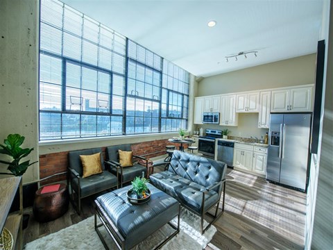 a living room with a couch and a table