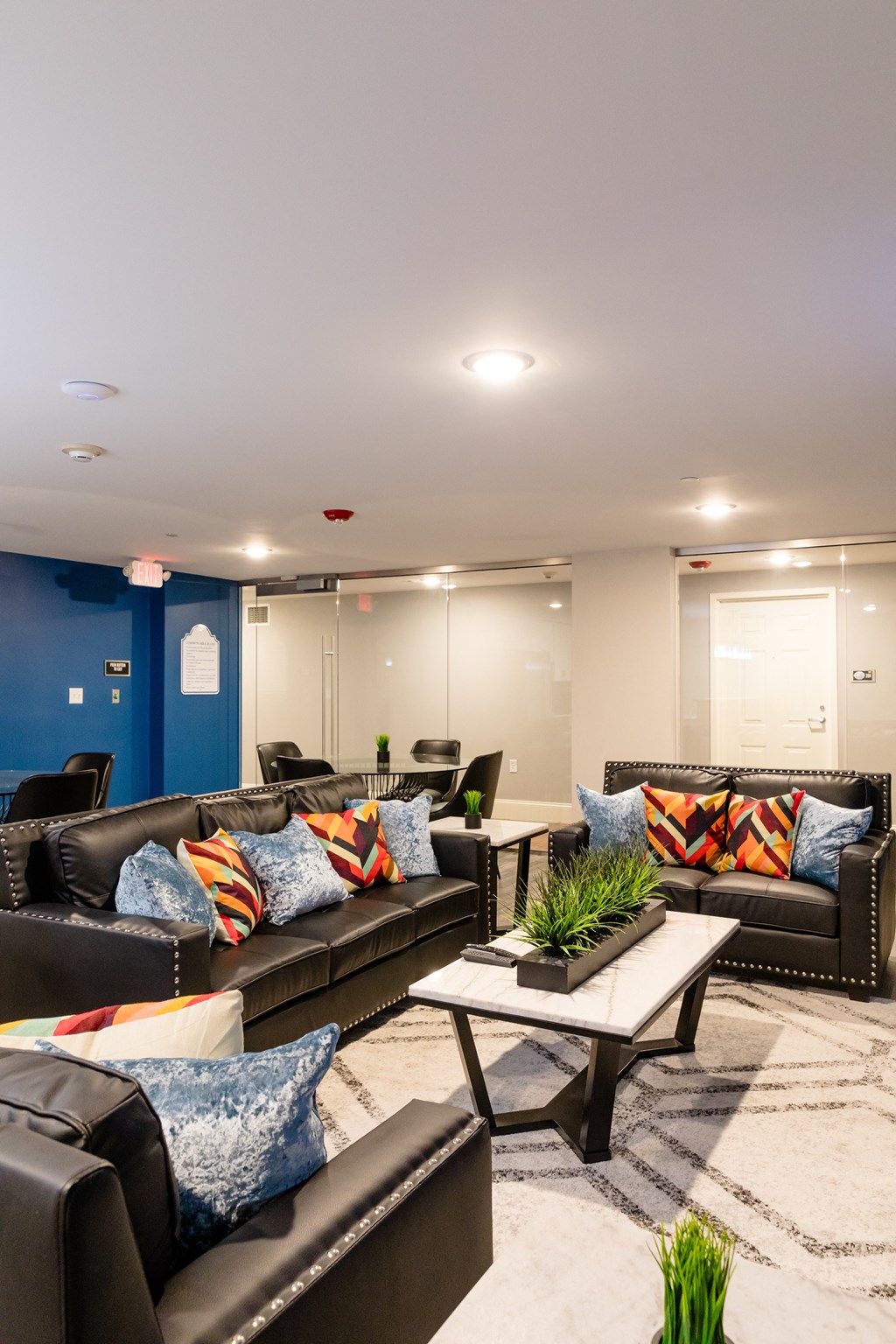 a large living room with couches and a coffee table