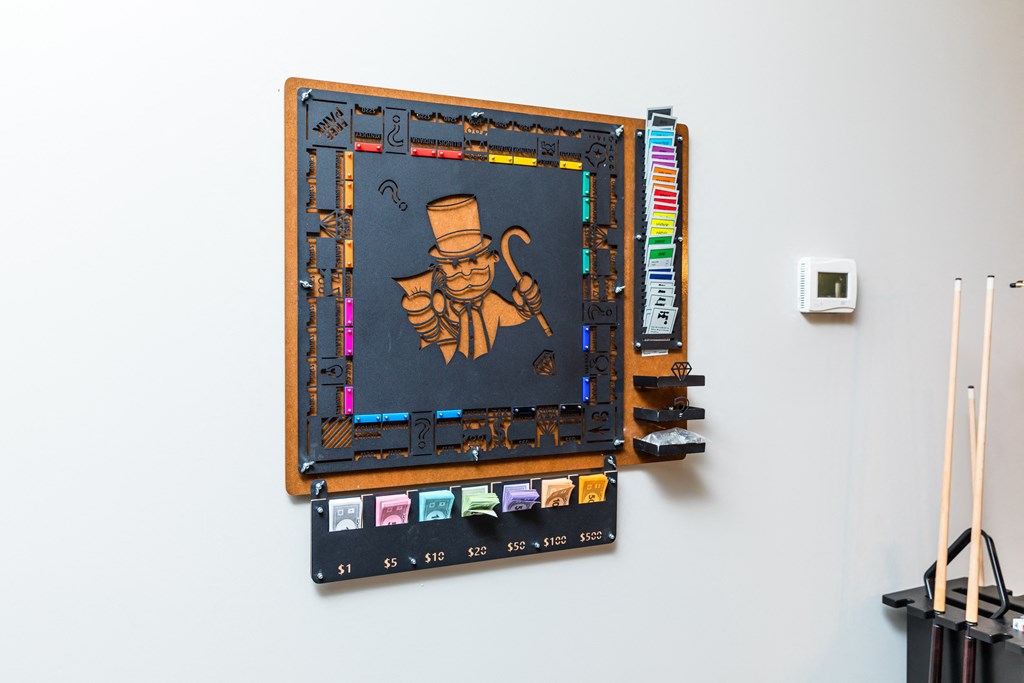 a board with a man in a top hat on it