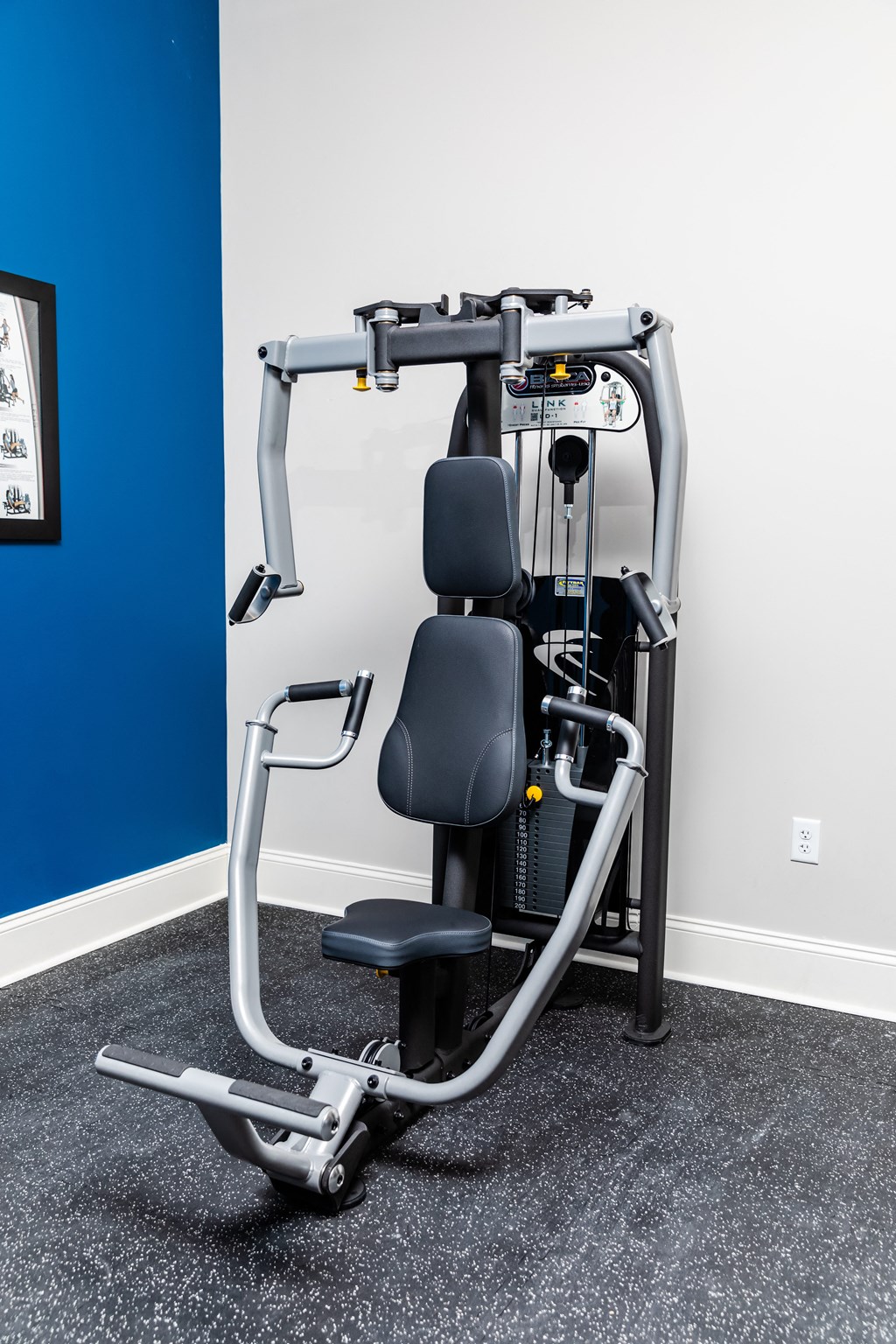 a gym with a exercise machine in a room