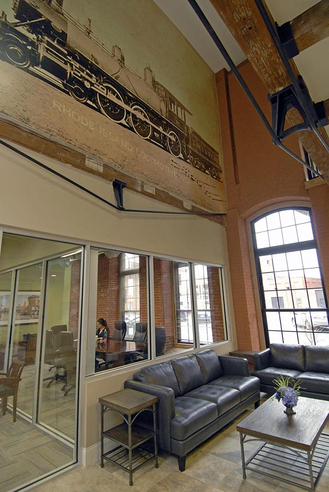 a living room with a couch and a table