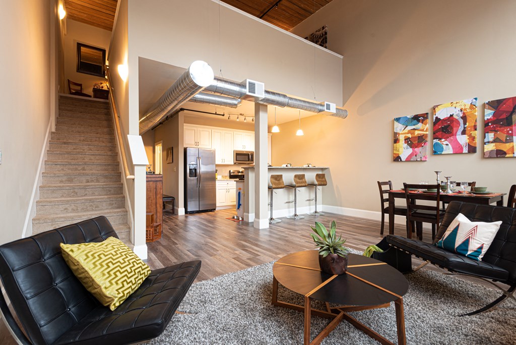 a living room with a couch and a table