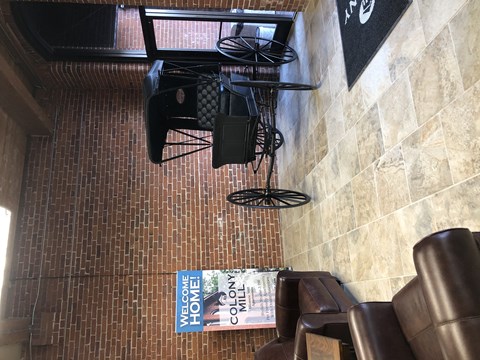 an overhead view of a basketball hoop in a room with chairs