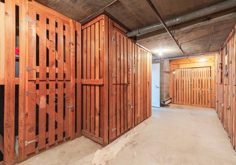 A room under construction with wooden studs on the walls.