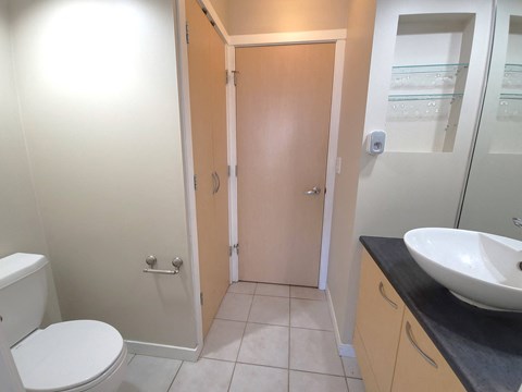 a bathroom with a toilet sink and a shower