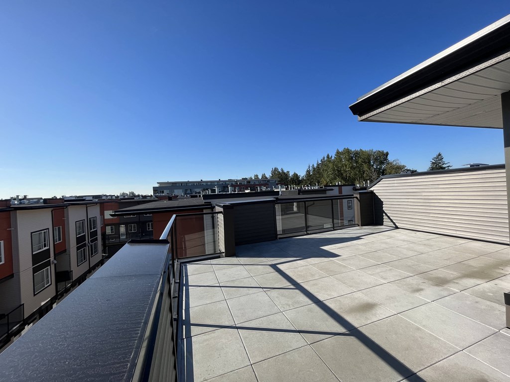 a view of the balcony from the roof of a building