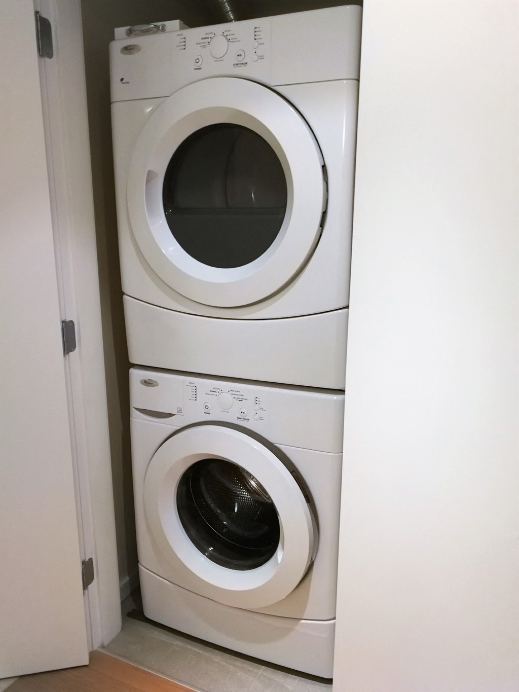 a washing machine and dryer in a laundry room