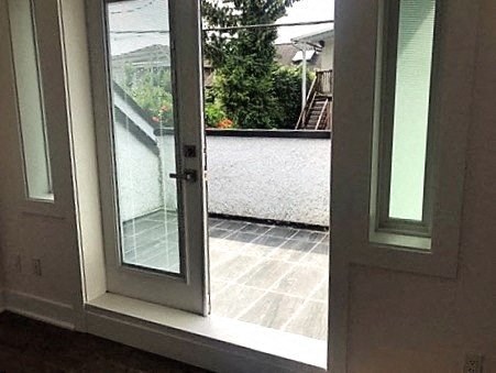 a window with a view of a balcony